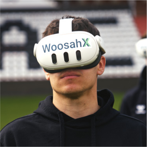 Athlete wearing a WoosahX headset