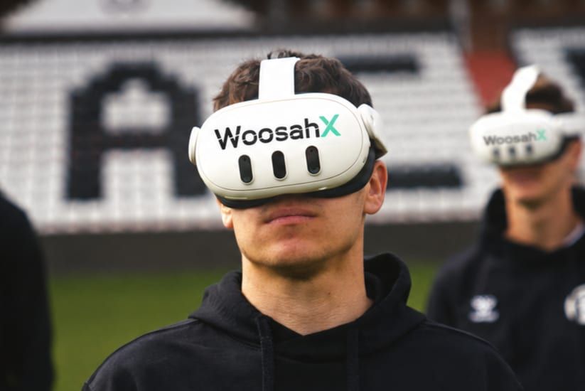 Athlete wearing a WoosahX headset