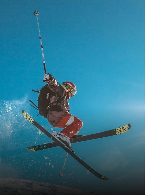 Skier performing an aerial jump